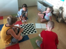 Come up with several ways to figure out how many spaces there are on a chess board.